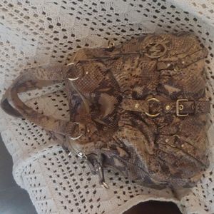 Michael Kors snake print leather bag. In great condition